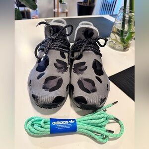 Adidas NMD Hu Pharrell sneakers. Grey and black animal print.